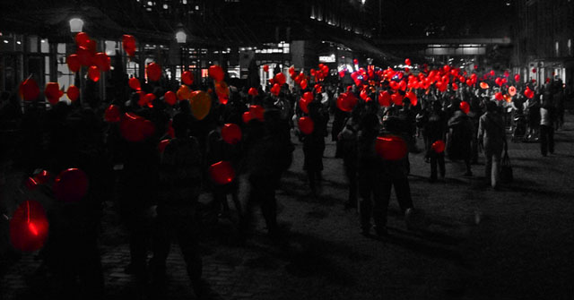 Thousands of red balloons go by...